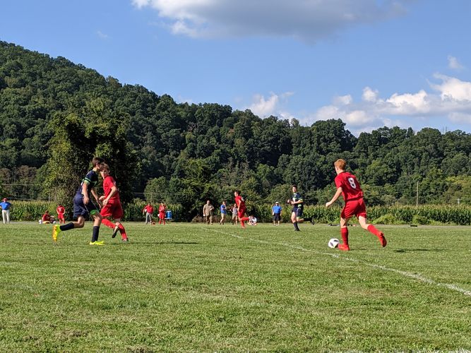 HCAMensSoccerhastheballagainstRMCA Athletics at Haywood Christian Academy