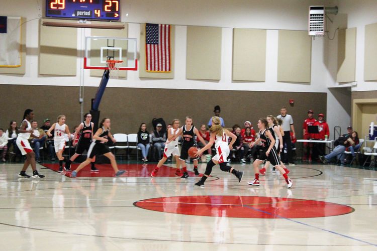 HCAMiddleSchoolGirlsBasketballTeamplaysVictoryChristianandwins30-27 Athletics at Haywood Christian Academy